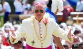 Bishop, Peter Brown – taking a bow before the grand-stand as he led the Autalavou Katoliko Puleaga Samoa Pago Pago in their taualuga, to close off their performance during the 2017 Flag Day entertainment.  [photo: TG]