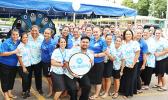 Bluesky Communications employees pose for a group photo, just before the dedication ceremony to open their newly renovated store at the Laufou Shopping Center, yesterday morning.  [photo: TG]