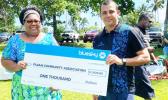 Bluesky presents $1,000 check