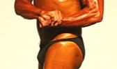 Overall Men’s Masters Winner – Floyd Scanlan flexing for the judges. [photo: TG]