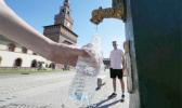 filling a plastic water bottle