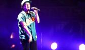 In this Dec. 2, 2016 file photo, Bruno Mars performs at the 2016 Jingle Ball at Staples Center, in Los Angeles. More than 300,000 visitors are expected to descend on Las Vegas for an extravagant New Year's Eve celebration. Nightclubs are pulling out all the stops with performances from DJ Calvin Harris, rappers T-Pain and Kendrick Lamar and artists Drake and Bruno Mars. (Photo by Chris Pizzello/Invision/AP, File) In this Dec. 2, 2016 file photo, Bruno Mars performs at the 2016 Jingle Ball at Staples Center, in Los Angeles. More than 300,000 visitors are expected to descend on Las Vegas for an extravagant New Year's Eve celebration. Nightclubs are pulling out all the stops with performances from DJ Calvin Harris, rappers T-Pain and Kendrick Lamar and artists Drake and Bruno Mars. (Photo by Chris Pizzello/Invision/AP, File)