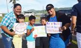 South Pacific Academy Teacher Maryanna Toilolo Ioane with her students Monday morning, as they join the Globe in celebrating “stomp out bullying.”  [Photo: JL]