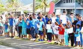 Faculty and staff of South Pacific Academy wore blue and along with all of their students joined the global awareness to stomp out bullying on Monday morning.  [Photo: JL]