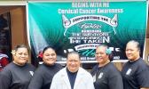 Cervical Cancer Awareness Month banner with LBJ staff standing in front