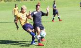 Chris Faamoana (right) of American Samoa and