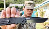 American Samoa son, Onosai Vine, Jr., equipped with a Ken Onion designed CRKT Homefront Tactical.  [Photo: Barry Markowitz]