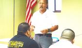 Ernest Haleck, a certified Firearms and Tactics Instructor from Honolulu, during yesterday's official opening of a training session held at the OMV conference room and aimed at preparing local cops to be armed. [photo: AF]