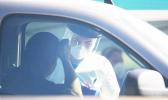 A man getting coronavirus test in drive through at Kakaako Waterfront Park in Hawaii.