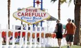 People walk by crosses placed near Las Vegas’ famous sign Thursday, Oct. 5, 2017, in Las Vegas. The crosses are in honor of those killed when Stephen Craig Paddock broke windows on the Mandalay Bay resort and casino and began firing with a cache of weapons at a country music festival Sunday. Dozens of people were killed and hundreds were injured. (AP Photo/Gregory Bull) People walk by crosses placed near Las Vegas’ famous sign Thursday, Oct. 5, 2017, in Las Vegas. The crosses are in honor of those killed when Stephen Craig Paddock broke windows on the Mandalay Bay resort and casino and began firing with a cache of weapons at a country music festival Sunday. Dozens of people were killed and hundreds were injured. (AP Photo/Gregory Bull)