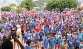 Crowds on the street of downtown Apia