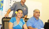  National Weather Service Office meteorologist Elinor Lutu-McMoore with local Department of Homeland Security officials Fale Ulufale and Vinnie Atofau.  [photo: FS]