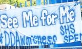 In support of Developmental Disability Awareness Month 2018, Samoana High School has on display, facing the main road on the fence around the gymnasium, signs that relay strong, powerful  messages. This particular sign reads: "See Me For Me." March is Developmental Disability Awareness Month in the territory and there are a host of activities scheduled for this week, as part of this year's recognition. [photo: Blue Chen-Fruean]