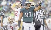 Eagles defensive tackle Destiny Vaeao celebrates his sack of San Francisco 49ers quarterback C.J. Beathard (lower left) during the game at Lincoln Financial Field October 29, 2017. Eagles won 33-10. [CLEM MURRAY / Staff Photographer]