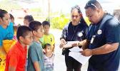 DOH crew distributing filariasis pills on Aunu'u