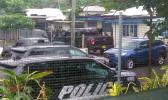 police cars outside home in Petesa during drug raid