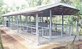 Due to the large size of pig operations, farmers in American Samoa build Dry-Litter facilities. Dry-Litter systems utilize organic material and waste combined with the composting process to eliminate all waste produced in pig rearing operation from entering the surrounding environment. A dry-litter piggery