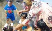 DOH Helping Hands Madelyn Aiava Aiono with children