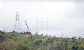  Workers restore high tension power lines damaged by Hurricane Maria in Guayama, Puerto Rico. [Photo: AFP via RNZI] 