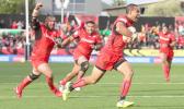 Team mates celebrate as Tonga's William Hopoate scores [Photo: Photosport vis RNZI] 