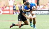  Gordon Langkilde is tackled during a World Series match against New Zealand.