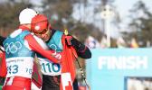  Morocco's Samir Azzimani (L) congratulates Tonga's Pita Taufatofua after he crossed the finish line during the men's 15km cross country freestyle at the Alpensia cross country ski centre during the Pyeongchang 2018 Winter Olympic Games on February 16, 2018 in Pyeongchang.  [AFP PHOTO / FRANCK FIFE vis RNZI]