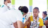  A girl receiving a vaccine