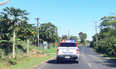 A Samoa police vehicle patrolling the highway