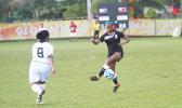 Elcy Lui of Amercan Samoa attempts to control the ball against