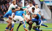 Ellis Genge tries to find a route through for England under heavy pressure from the blue-shirted Samoans [Reuters via Daily Mail]