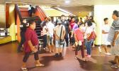 Crowds of people inside the EOB