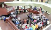 A view of the atrium at the EOB crowded with people