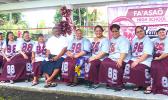 Father Kelemete Puaauli (middle wearing white shirt), surrounded by some of the graduates from Fa’asao High School Class of 1988