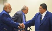 Fetu Fetui Jr shaking hands with Rep. Sataua Dr. Mataese Samuelu 