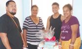 Family of New Years baby with gift packages