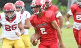 Faga’itua Vikings quarterback Fitu Amata Jr. breaking