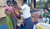 Woman receives a measles vaccination in Fiji