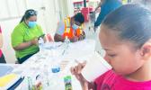 Little girl taking Lymphatic Filiariasis pills