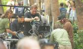 A film crew working on the streets of Honolulu