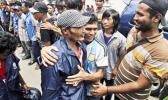In this Sept. 8, 2015 photo, a Burmese fisherman, center, is embraced by a friend as he leaves the port town of Ambon, Maluku province, Indonesia. More than 2,000 fishermen have been rescued this year from brutal conditions at sea, their freedom prompted by an Associated Press investigation into seafood brought to the U.S. from a slave island in eastern Indonesia. Dozens of Burmese men in the bustling port town of Ambon were the latest to go home, some more than a decade after being trafficked onto Thai trawlers. (AP Photo/Achmad Ibrahim) In this Sept. 8, 2015 photo, a Burmese fisherman, center, is embraced by a friend as he leaves the port town of Ambon, Maluku province, Indonesia. More than 2,000 fishermen have been rescued this year from brutal conditions at sea, their freedom prompted by an Associated Press investigation into seafood brought to the U.S. from a slave island in eastern Indonesia. Dozens of Burmese men in the bustling port town of Ambon were the latest to go home, some more than a decade after being trafficked onto Thai tra