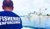 A fisheries officer in Majuro heads out to to inspect purse seine fishing vessels anchored in Majuro's lagoon. Photo: Francisco Blaha A fisheries officer in Majuro heads out to sea