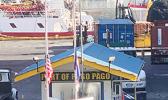 Flags flying at half staff at Port