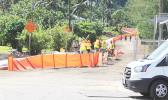 Red cones blocking access to the road under construction