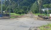 the four-corner intersection: the road from Fagaima heading into Kokoland area, as well as into Ottoville; and the unpaved road (up ahead), passing through the Fonoti family property, and further up to the Leapaga family land on to the main road in Malaeimi. 