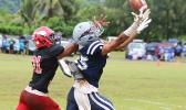 Allen Seagai focuses on hauling in this catch