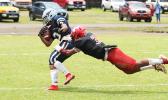 Kobe Lefiti crossing the goal line