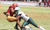 John Allen of Tafuna HS holding the ball