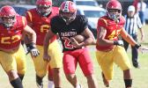 Joseph Umu of the Vikings beating three Warriors on the run