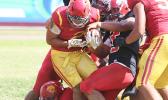 Faga’itua defenders trying to strip the ball out of Koison Ozu’s grip