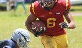 Isaiah Gurr of the Warriors with the ball at the sidelines